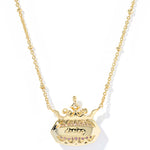 Kendra Scott Disney Princess Elisa Necklace, Ninth View, the engraved back of the gold pendant reading daring