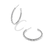 Kendra Scott Fate Hoop Earrings in rhodium silver, a pair of open hoops lined with small spikes and cubic zirconia