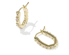 Kendra Scott Fate Huggie Earrings in gold, a pair of hinged oval huggies with spike and cubic zirconia detail