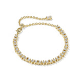 Kendra Scott Fate Tennis Bracelet in gold with a row of white cubic zirconia and extender chain