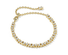 Kendra Scott Fate Tennis Bracelet in gold with a row of white cubic zirconia and extender chain
