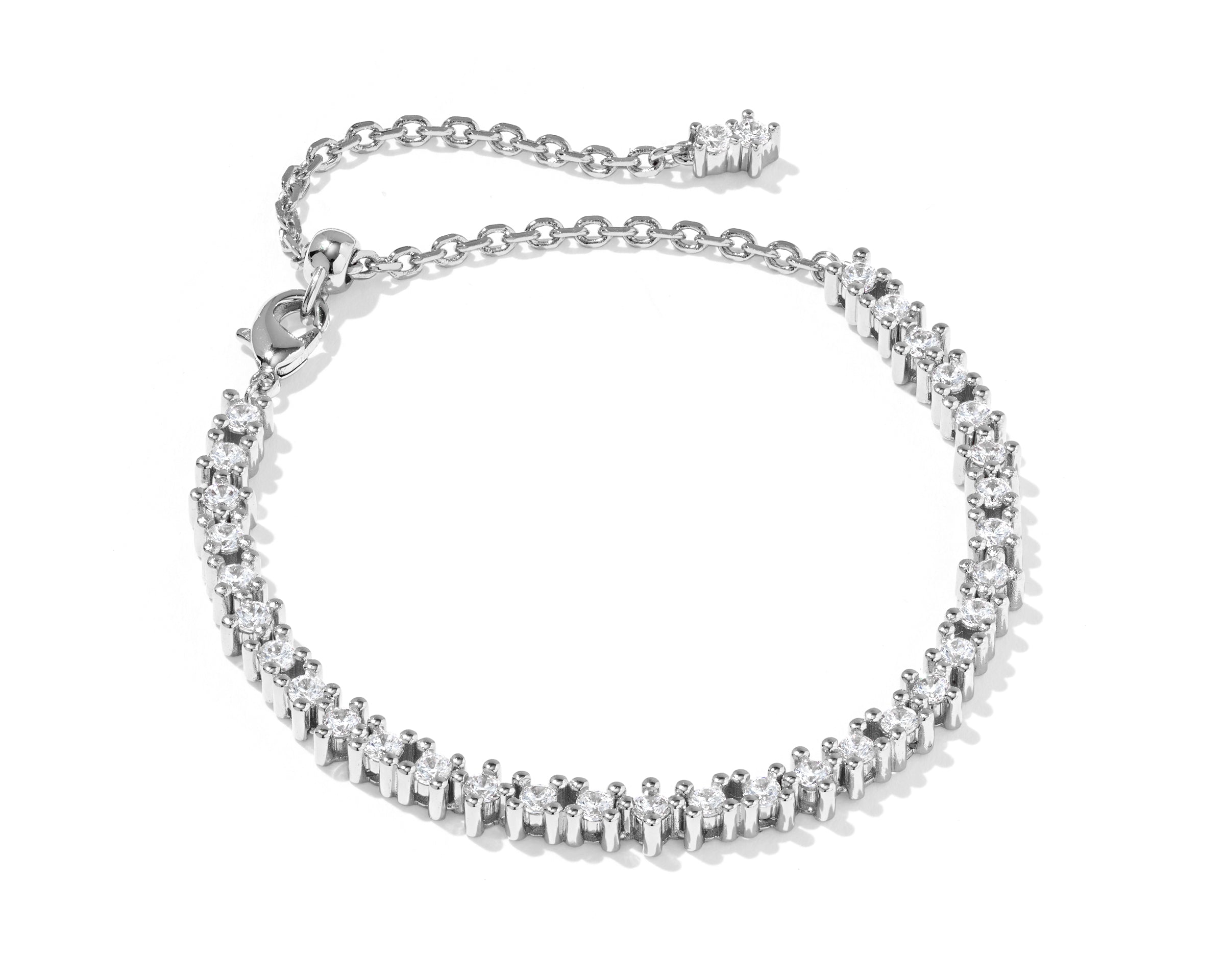 Kendra Scott Fate Tennis Bracelet in rhodium silver with a row of white cubic zirconia and extender chain