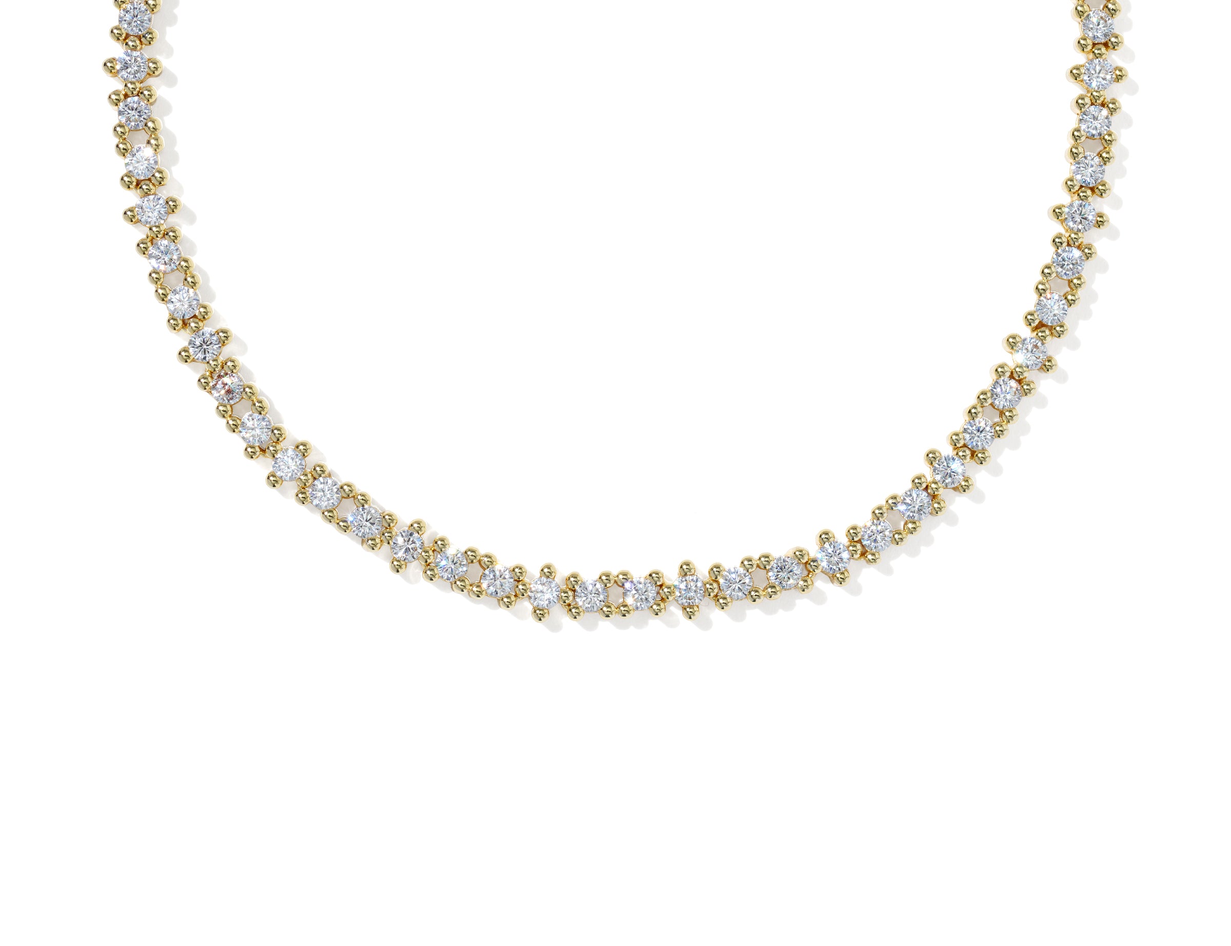 Kendra Scott Fate Tennis Necklace in gold, close up of the cubic zirconia line