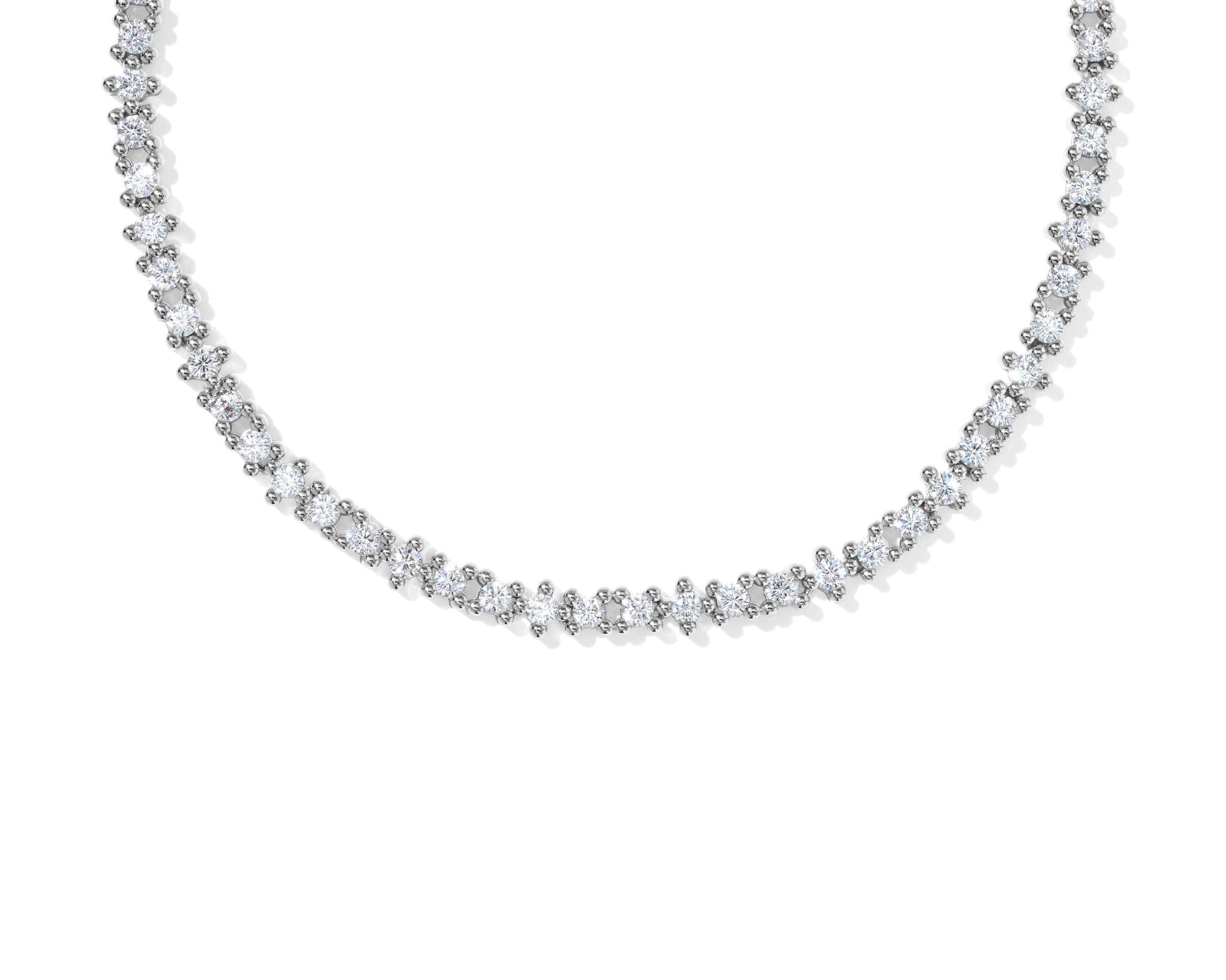 Kendra Scott Fate Tennis Necklace in rhodium silver, close up of the cubic zirconia line