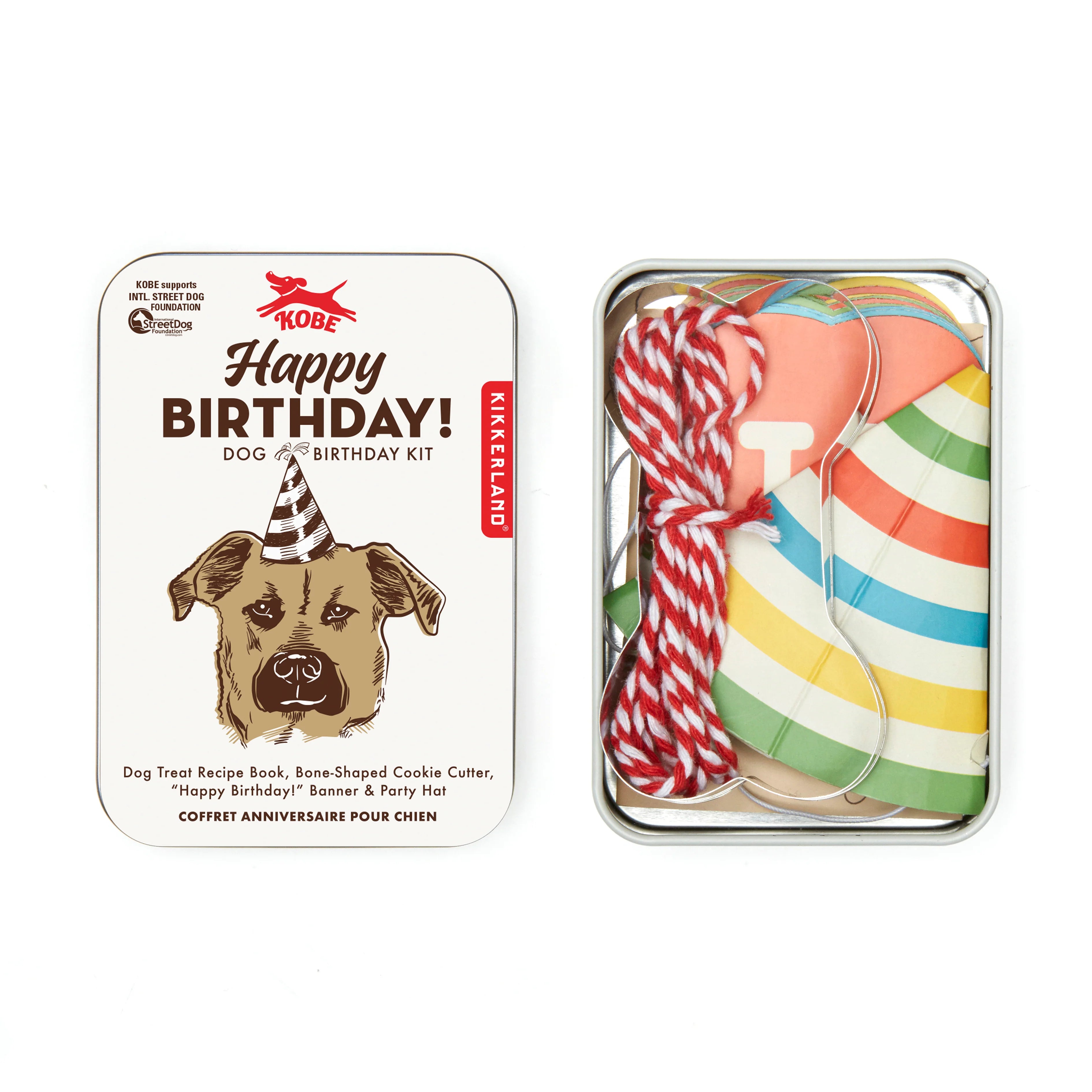 Kikkerland Dog Birthday Kit tin with a cookie cutter, banner, party hat and string inside