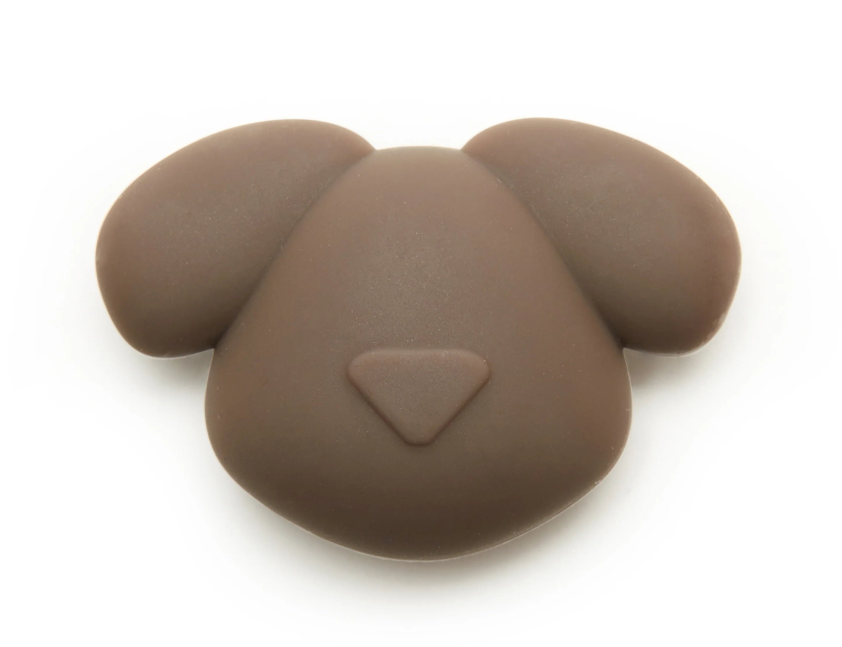 Kikkerland Kobe Air Tag Holder, a brown silicone dog-face shaped AirTag case
