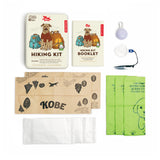 Kikkerland Kobe Hiking Kit contents: tin, booklet, poop bags, wet wipes, paper bowls, dog light and tick tool