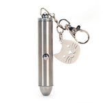 Kikkerland Laser Pointer cat toy, a silver keychain pointer with a cat face charm