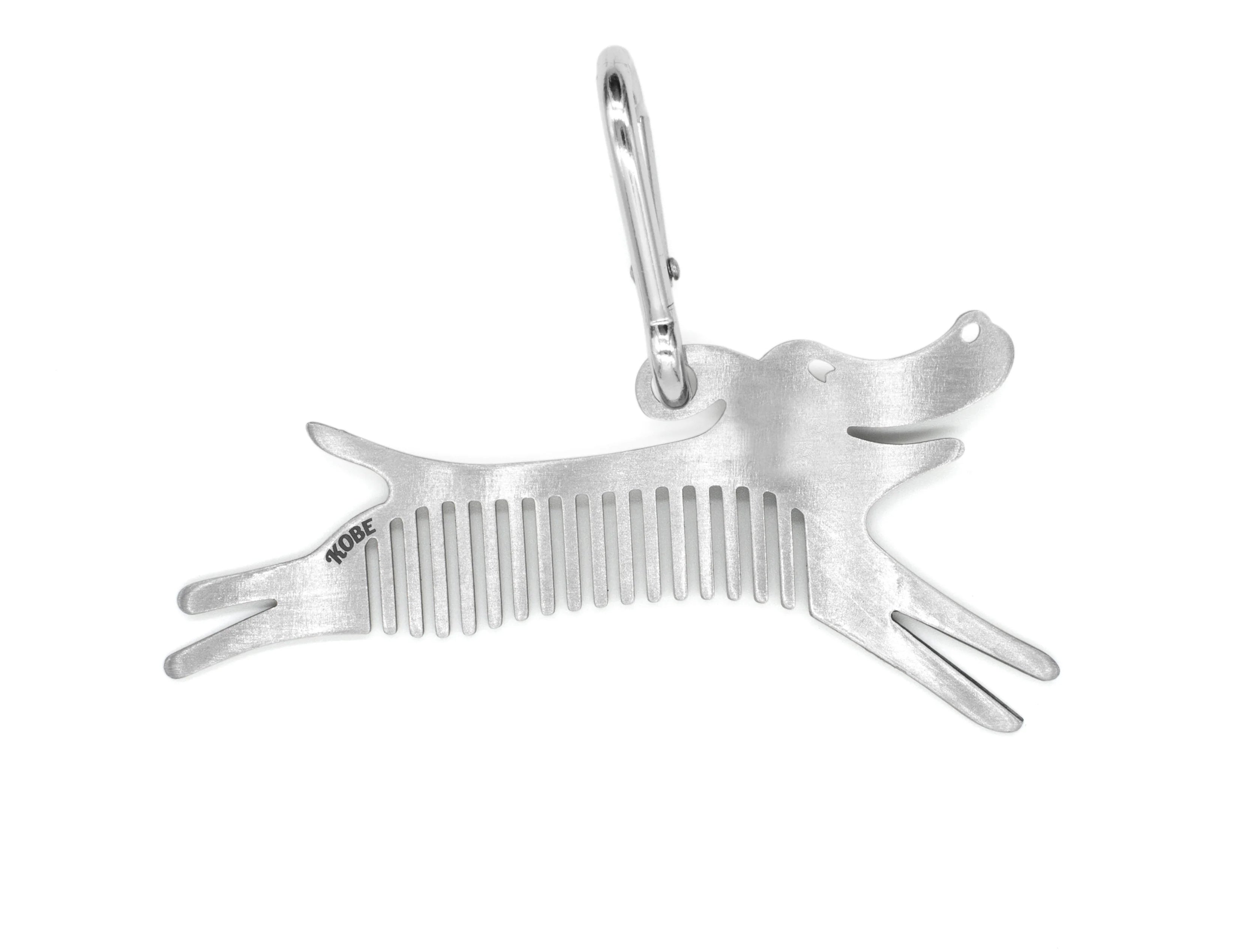 Kikkerland Tick Tool stainless steel dog-shaped comb, angled view