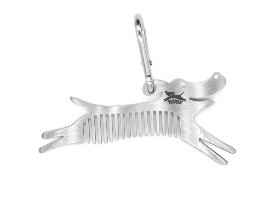 Kikkerland Tick Tool, a stainless steel dog-shaped tick comb with a carabiner clip