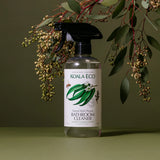 Koala Eco Natural Multi-Purpose Bathroom Cleaner bottle under eucalyptus branches on a green background