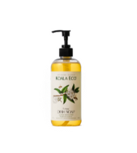 Koala Eco Natural Dish Soap in a clear pump bottle with a botanical label