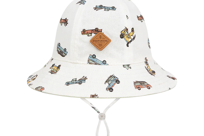 Kooringal Dozer Boys Bucket Hat in Bowen, a cream bucket hat with a vintage car print and chin cord