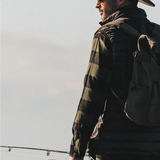 Man in a plaid jacket wearing the Kooringal Nomad Cowboy Hat in Sand outdoors