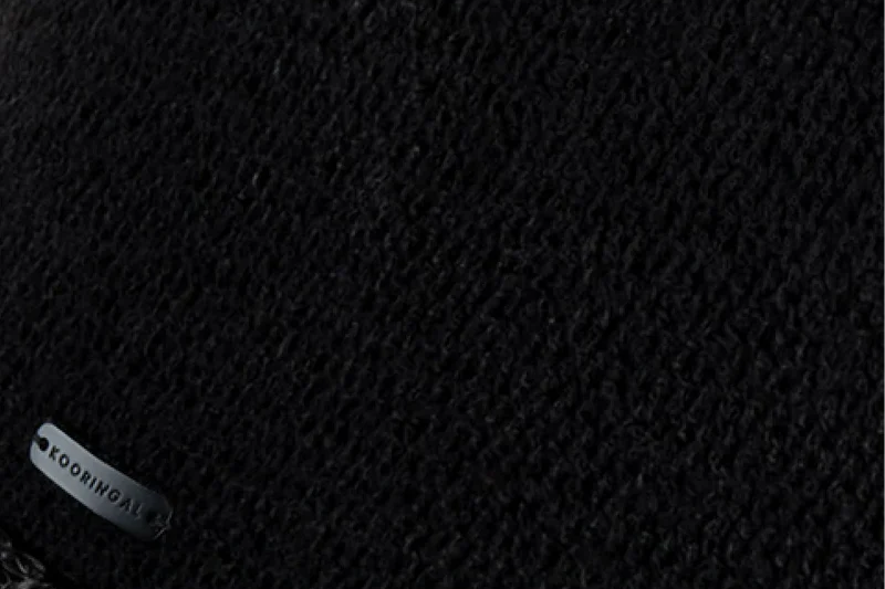 Close-up of the knit texture and Kooringal tag on the Women's Safari Sadie hat in Black