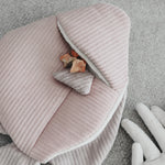 Lambwolf Collective Angel Fish Dog Toy in pink corduroy, close-up of a treat tucked into the snuffle pocket