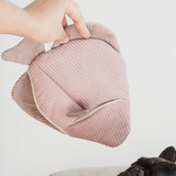 Lambwolf Collective Angel Fish Dog Toy in pink corduroy held in a hand showing the treat pocket