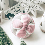Lambwolf Collective Monti Enrichment Dog Toy in Pink with its Let Them Sniff tag among holiday decor