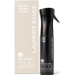 Laundry Sauce Fabric Refresher Spray in Himalayan Cashmere, a black spray bottle beside its cream box
