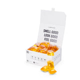 Laundry Sauce Laundry Detergent Pods in Siberian Pine, an open white box of amber pods