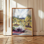 Laurie Anne Art Brush Desert Fine Art Print in a thin gold frame leaning against a wall on a wood floor
