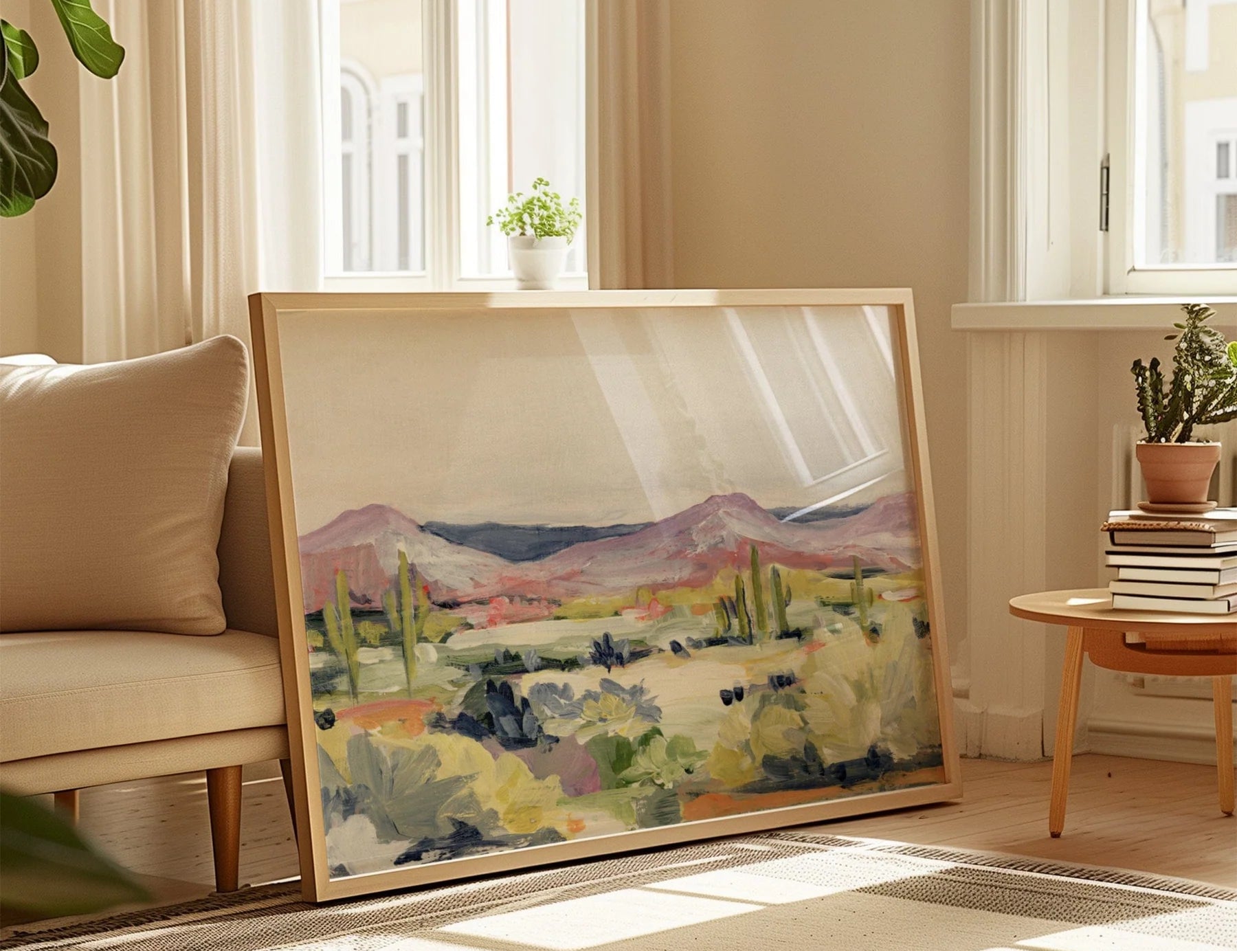 Laurie Anne Art Desert Flora Fine Art Print in a wood frame leaning against a wall in a sunlit living room