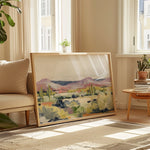 Laurie Anne Art Desert Flora Fine Art Print in a wood frame leaning against a wall in a sunlit living room