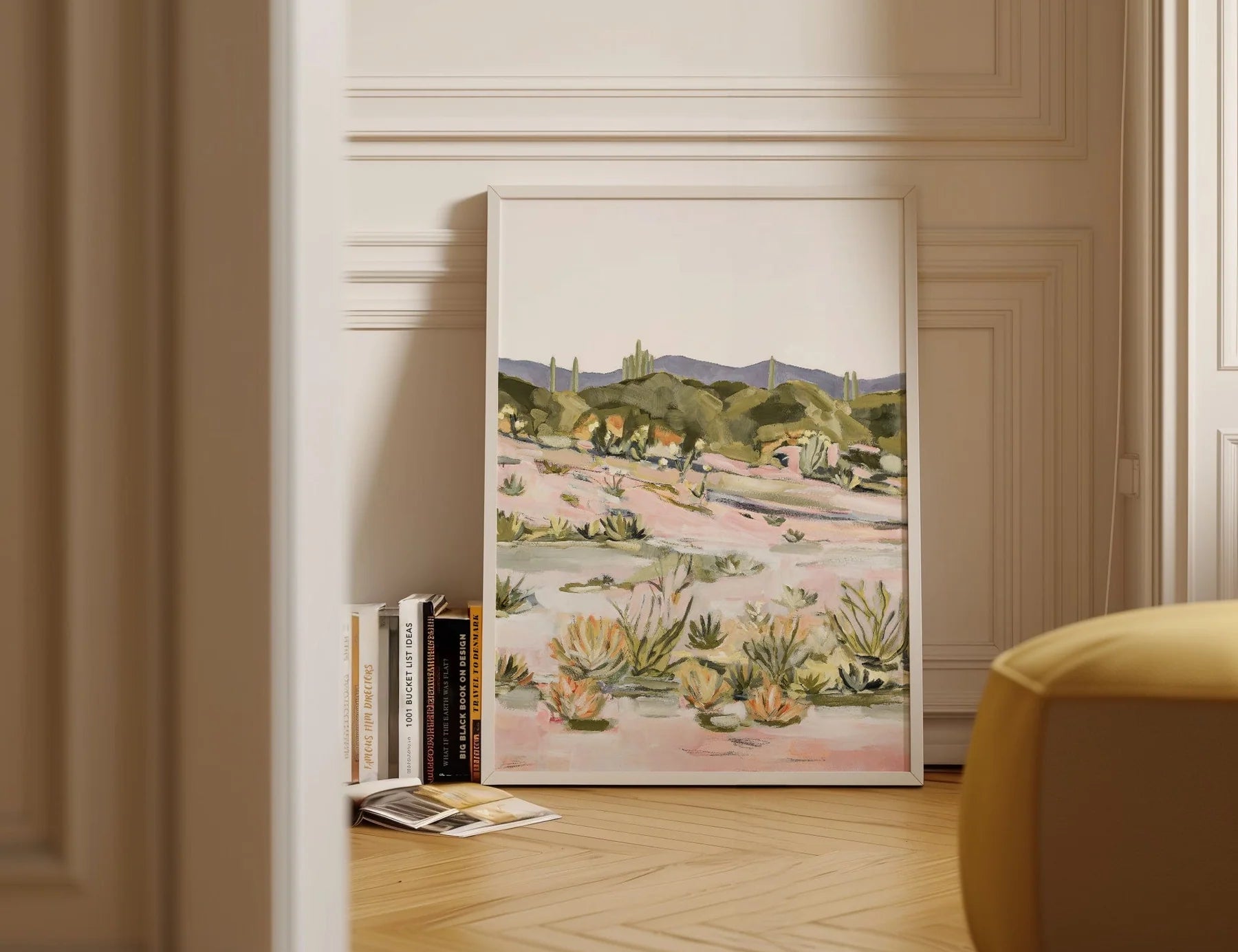 Laurie Anne Art Desert Glory Fine Art Print in a wood frame leaning against a wall on a herringbone floor
