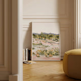 Laurie Anne Art Desert Glory Fine Art Print in a wood frame leaning against a wall on a herringbone floor