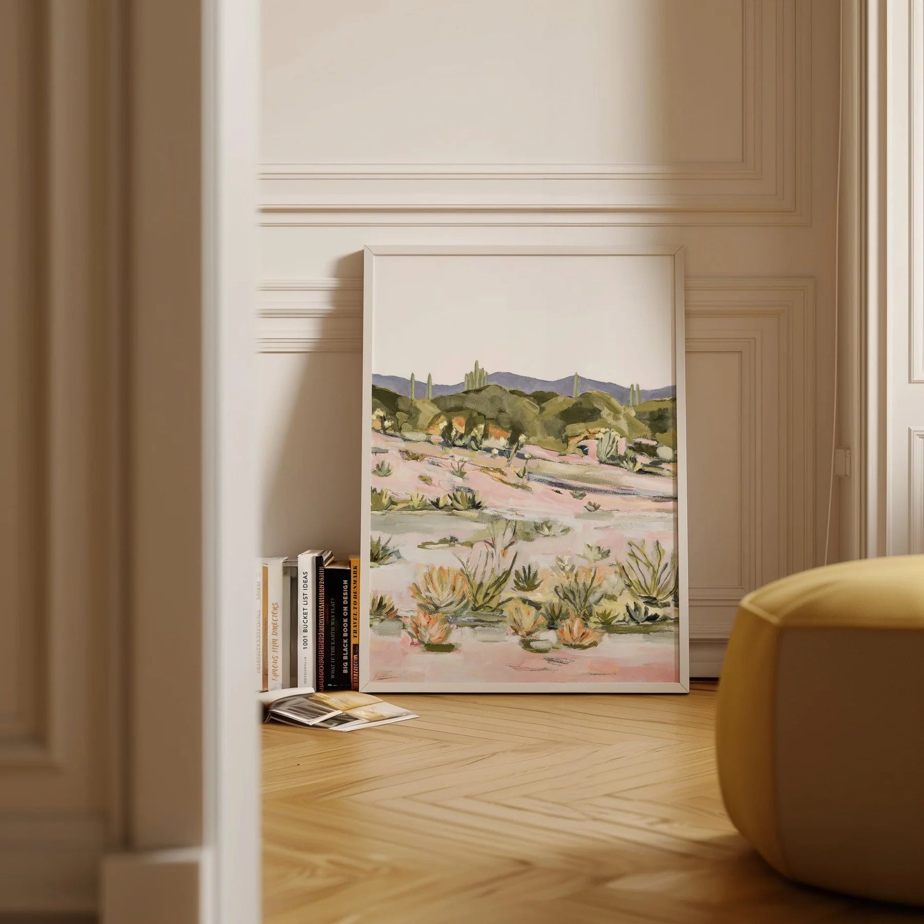 Laurie Anne Art Desert Glory Fine Art Print in a wood frame leaning against a wall on a herringbone floor