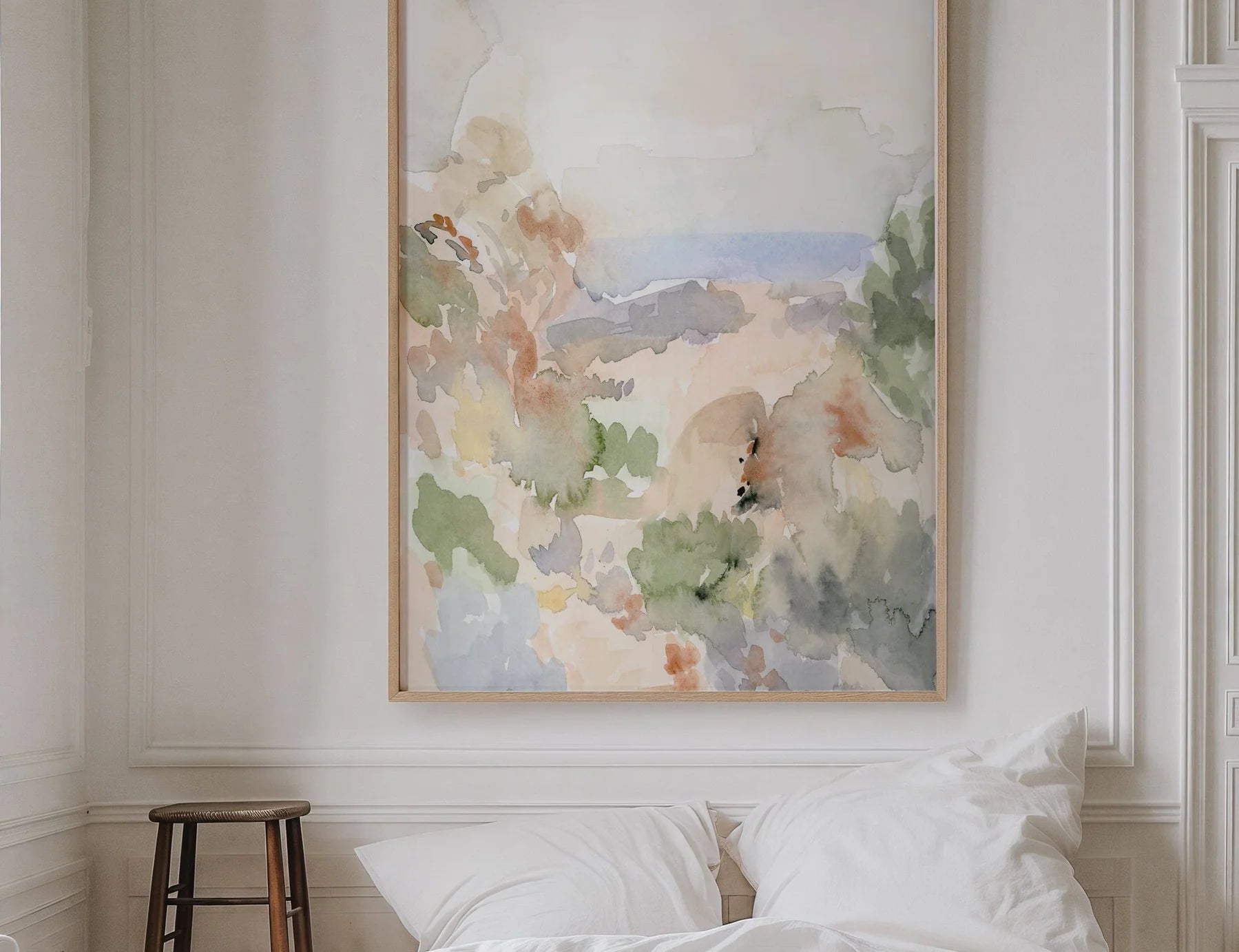 Laurie Anne Art Pastel Wash Fine Art Print framed above a white bed