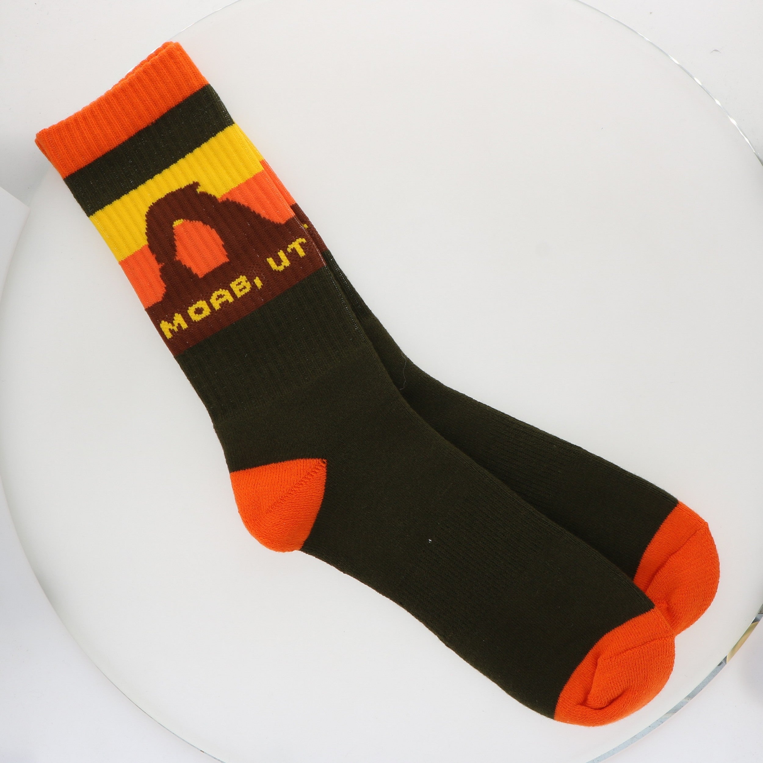 Locale Moab Arches Dark Green Socks, dark green crew socks with an arch sunset cuff and orange trim