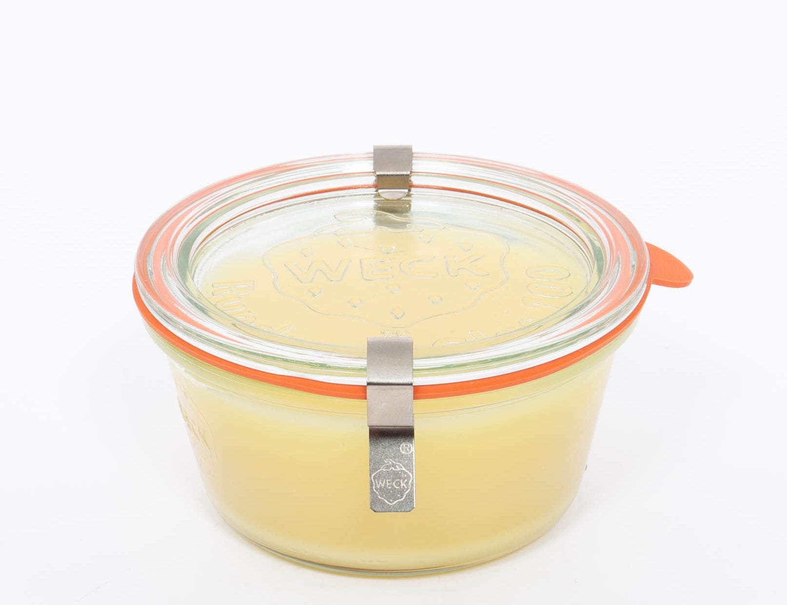 Los Poblanos Rosemary Board Butter, a glass jar of pale yellow wood conditioner with an orange lid