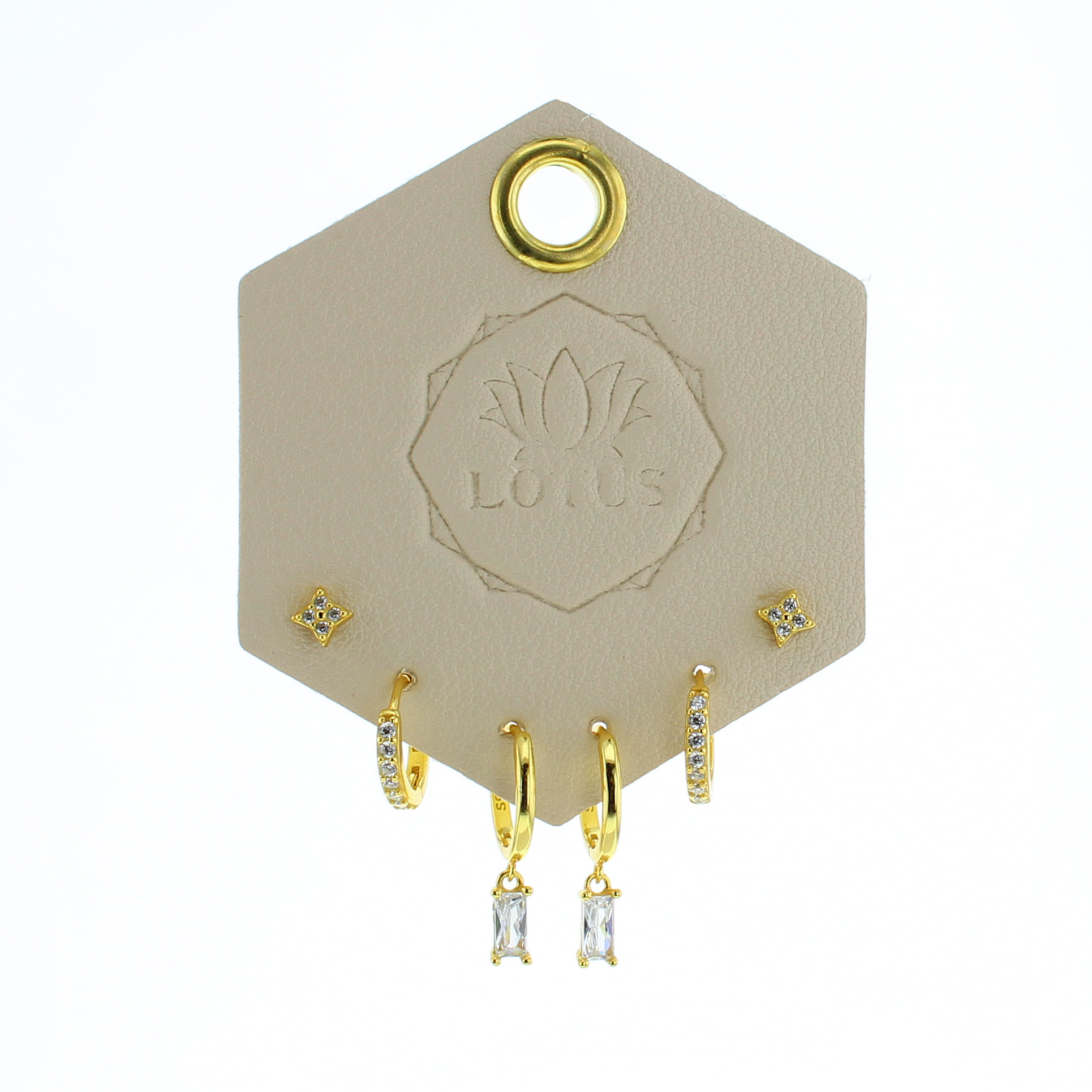 Lotus Studio Gold Trio Earrings in Camila, flower studs, pave huggies and baguette drop hoops on a Lotus card