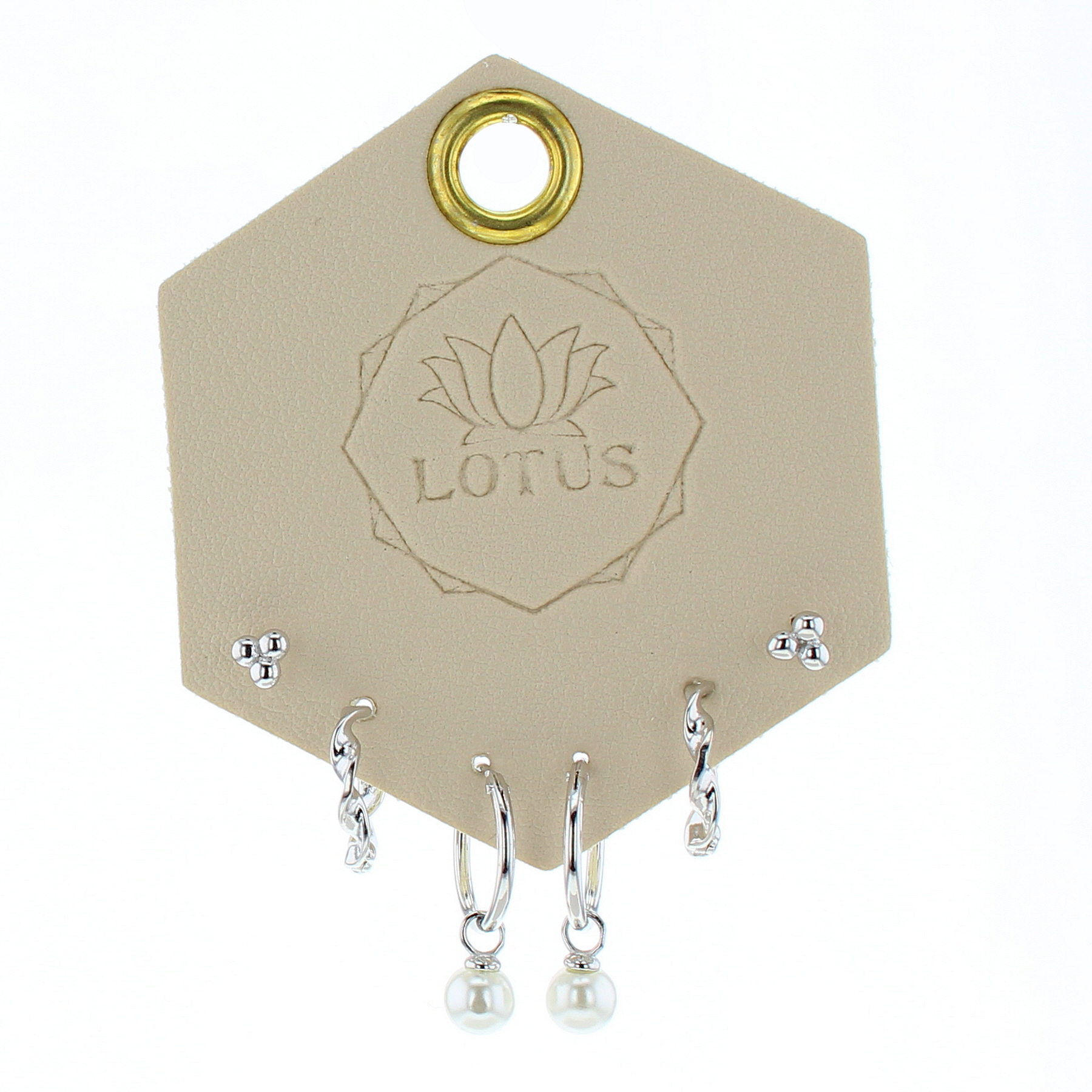 Lotus Studio Silver Trio Earrings in Audrey, dot studs, pave huggies and pearl drop hoops on a Lotus card