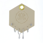 Lotus Studio Silver Trio Earrings in Evelyn, crystal studs, pave huggies and teardrop hoops on a Lotus card