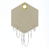 Lotus Studio Silver Trio Earrings in Hoop, three pairs of thin silver hoops in graduated sizes on a Lotus card