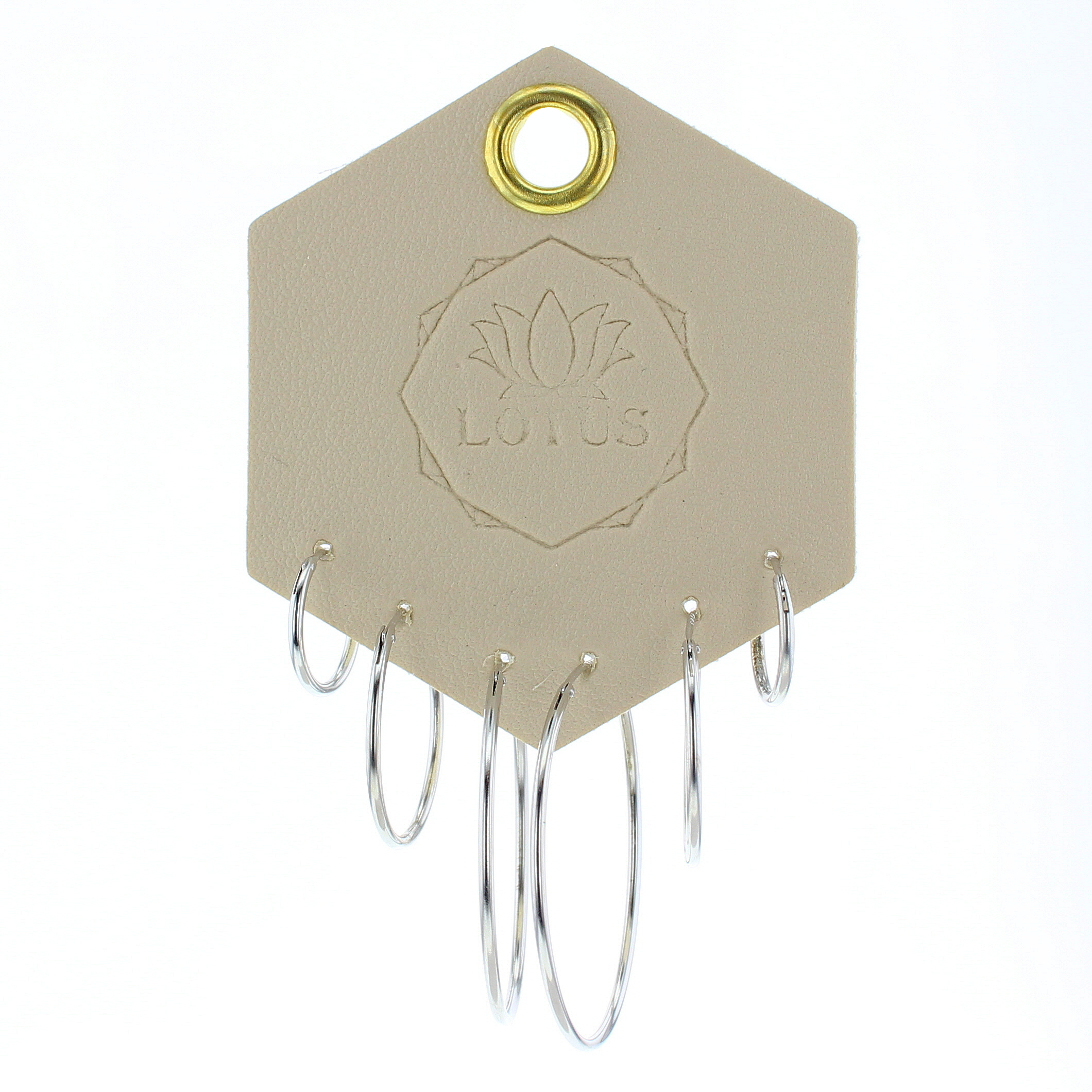Lotus Studio Silver Trio Earrings in Hoop, three pairs of thin silver hoops in graduated sizes on a Lotus card