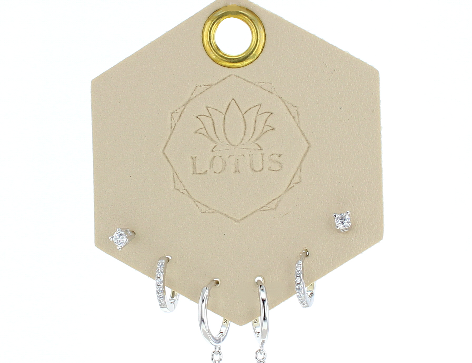 Lotus Studio Silver Trio Earrings in Lucy, crystal studs, huggies and teardrop crystal hoops on a Lotus card