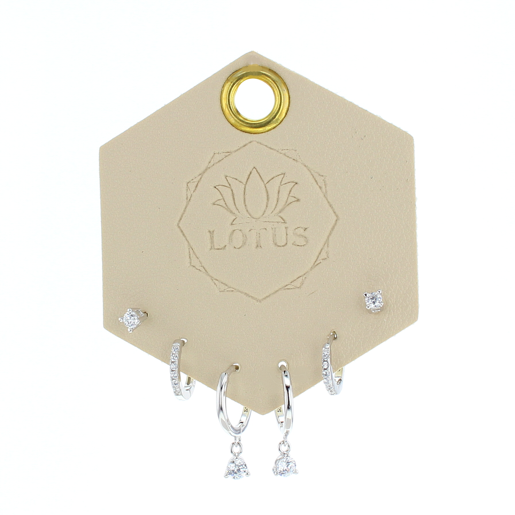 Lotus Studio Silver Trio Earrings in Lucy, crystal studs, huggies and teardrop crystal hoops on a Lotus card