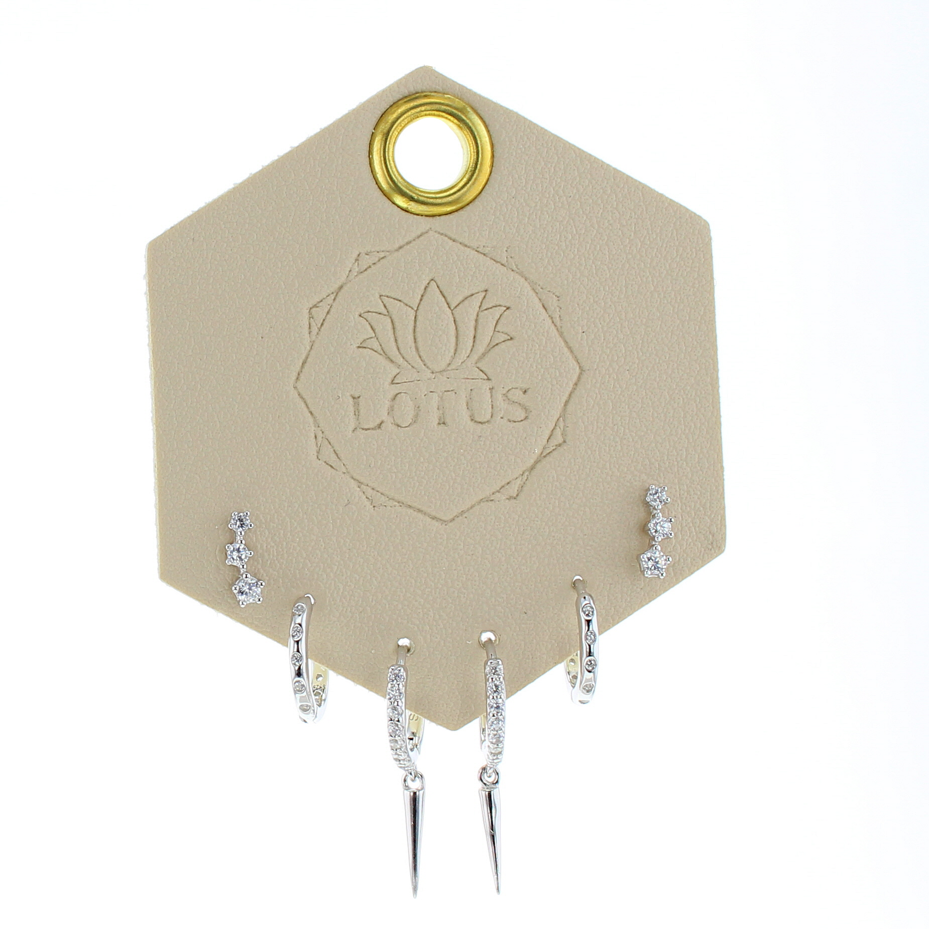 Lotus Studio Silver Trio Earrings in Natalie, crystal bar studs, pave huggies and drop hoops on a Lotus card