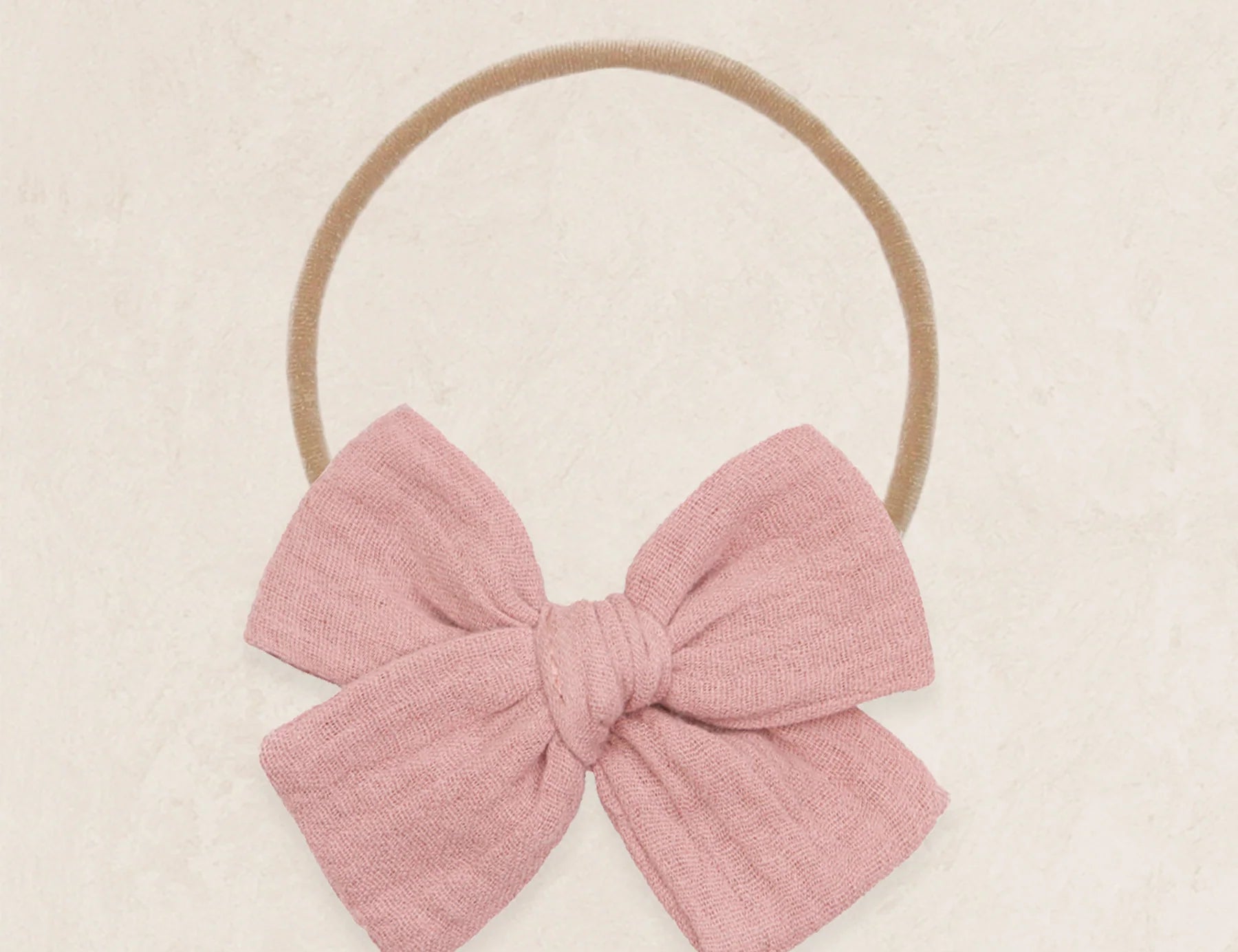 Lou Lou & Company Adventure Bow in Mauve Pink, cotton muslin bow on a soft nylon headband