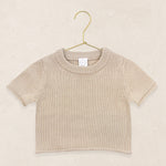Lou Lou & Company Knit Short Sleeve Tee in Tan, a cotton knit baby tee on a hanger