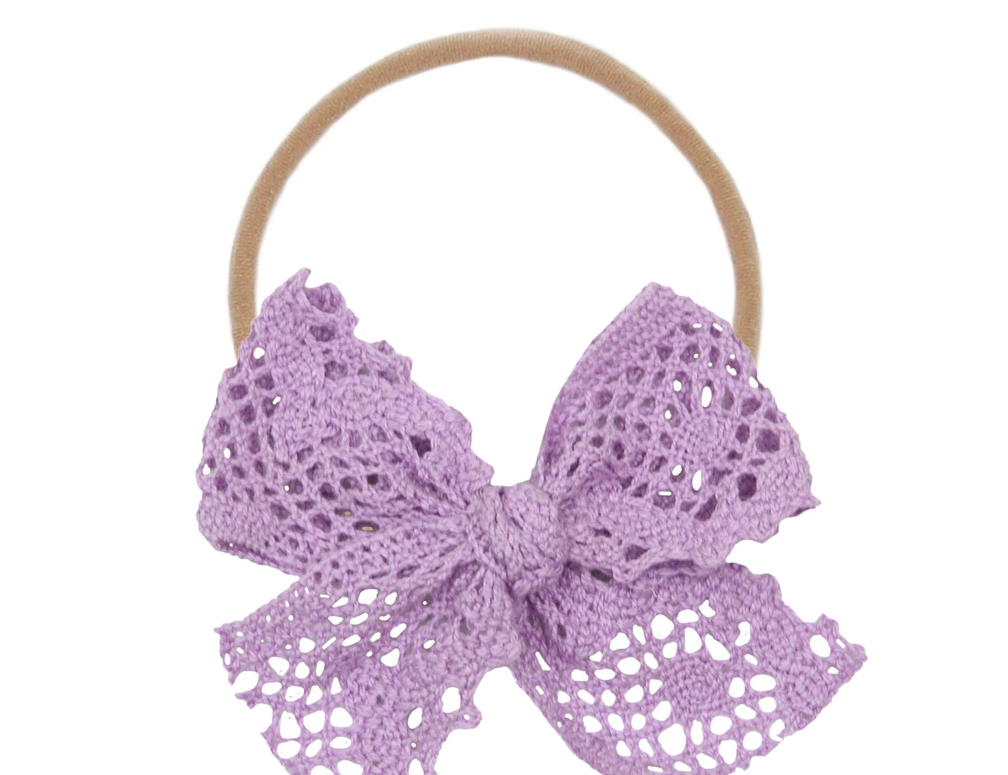 Lou Lou & Company Lace Bow Headband in Lavender, a purple crochet lace bow on a soft nylon band
