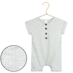 Lou Lou & Company Ribbed Romper in Stevie, a heather gray short-sleeve henley romper on a hanger