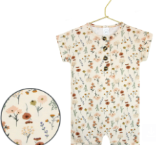Lou Lou & Company Romper in Rachel, a cream floral short-sleeve henley romper on a hanger