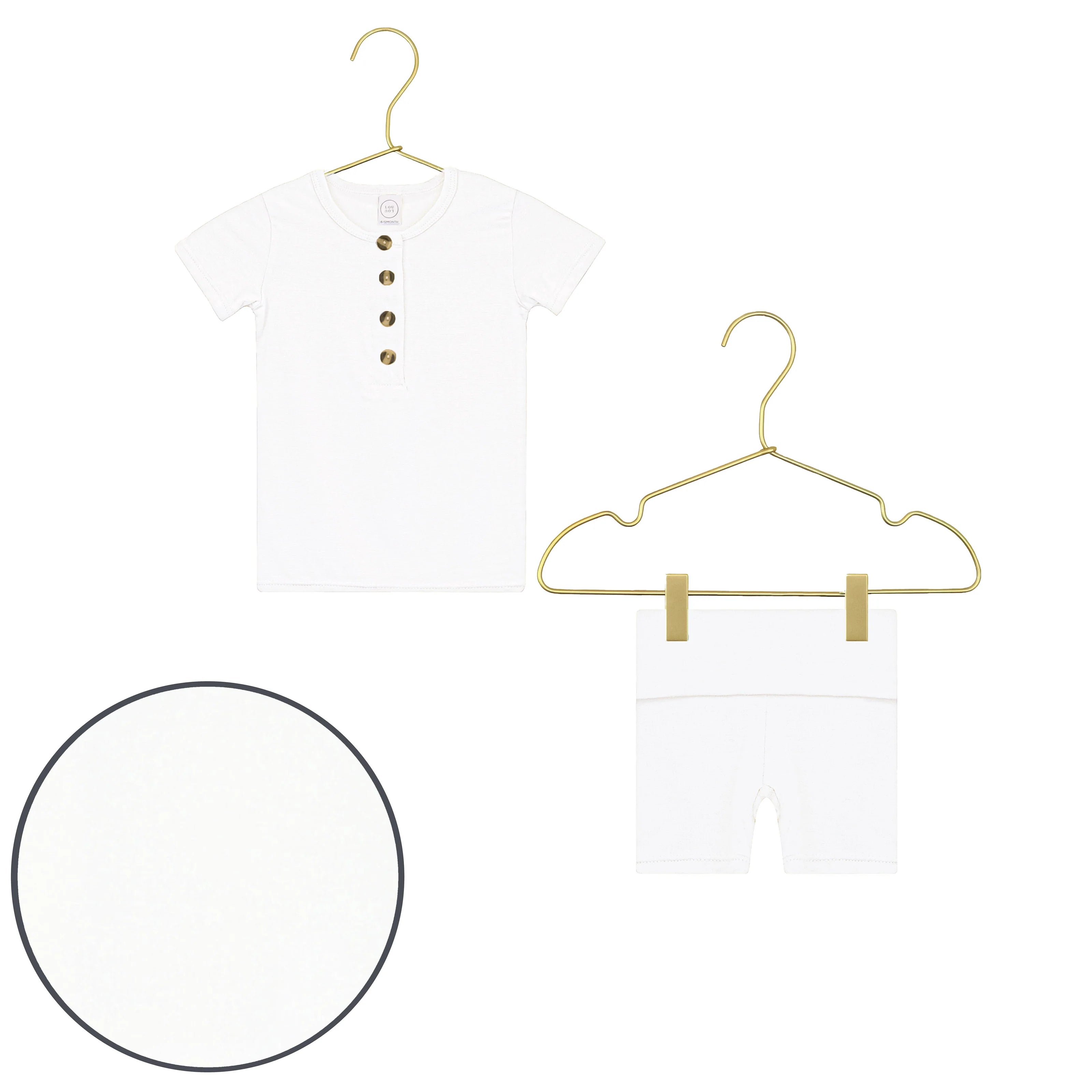 Lou Lou & Company Shortie Set in Finley, a white henley tee and shorts on hangers