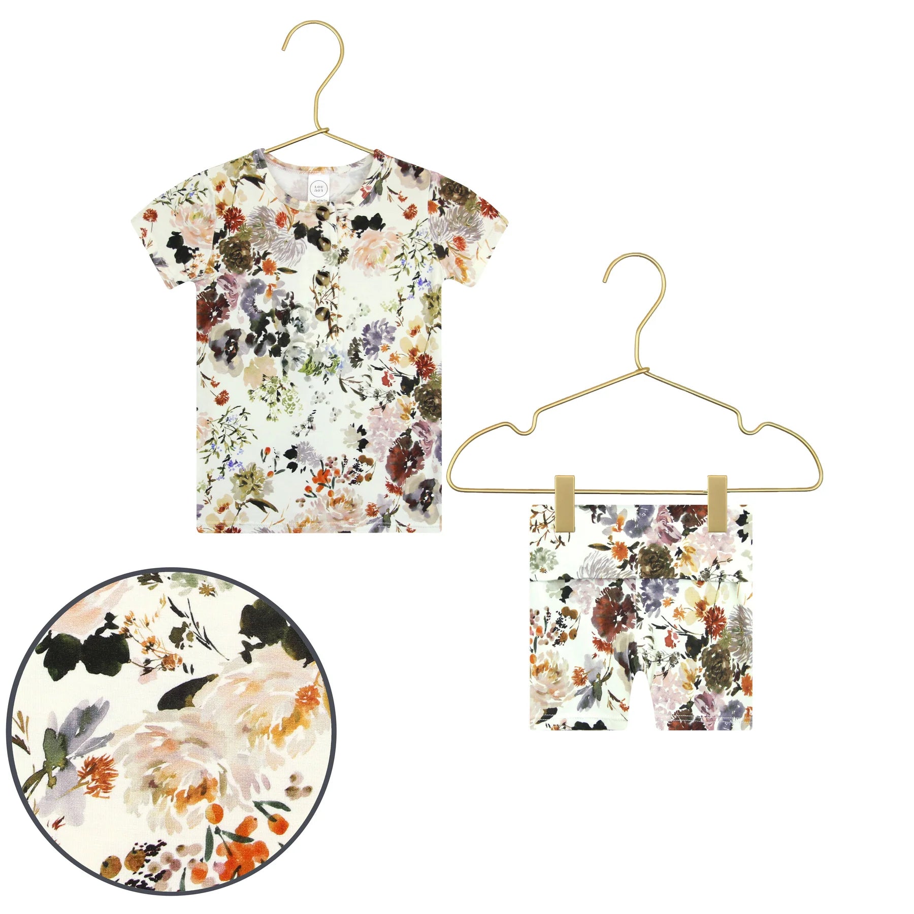 Lou Lou & Company Shortie Set in Nellie, a cream floral henley tee and shorts on hangers