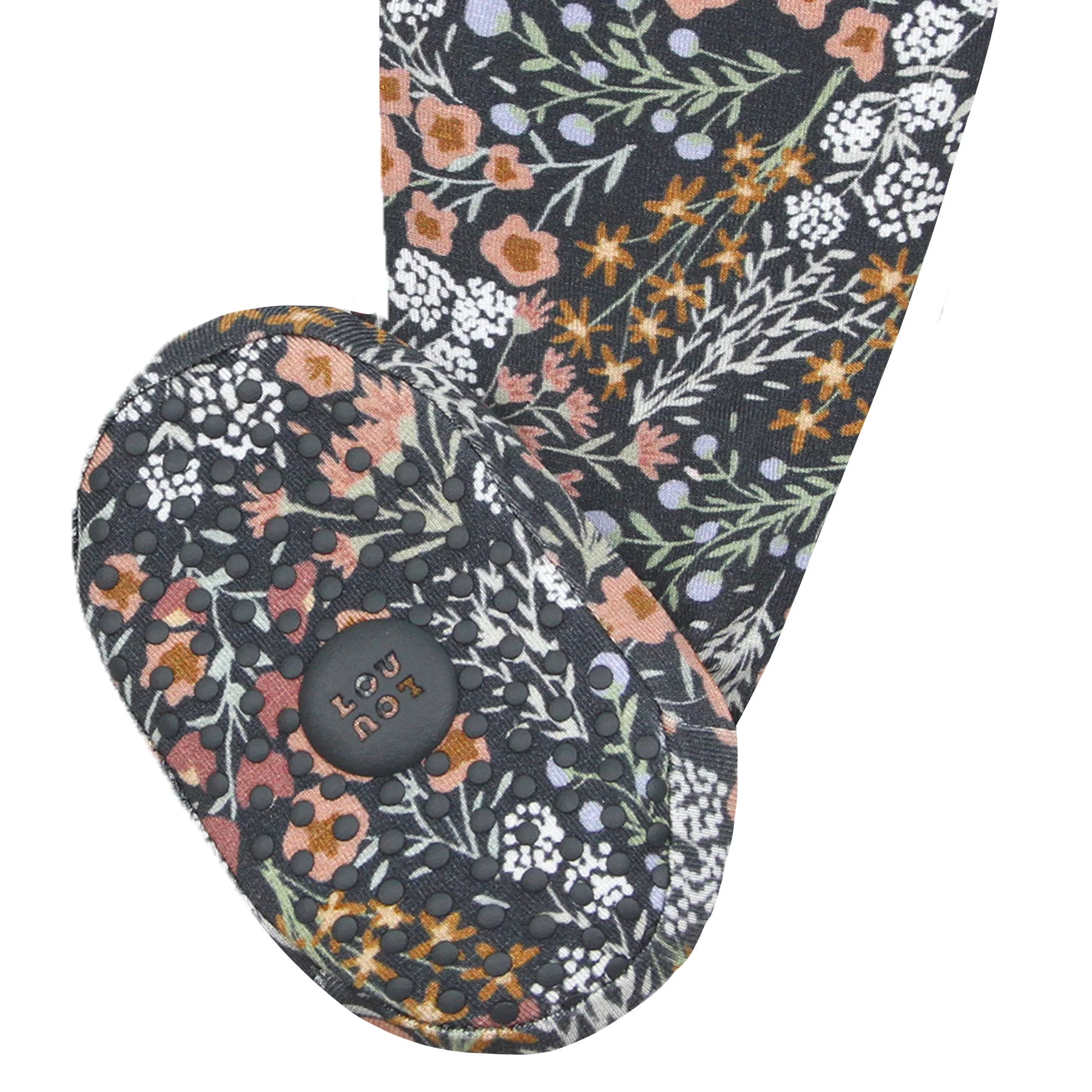 Close-up of the non-slip grip sole on the Lou Lou & Company Zipper Footies in Bae
