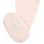 Close-up of the non-slip grip sole on the Lou Lou & Company Zipper Footies in Rosie